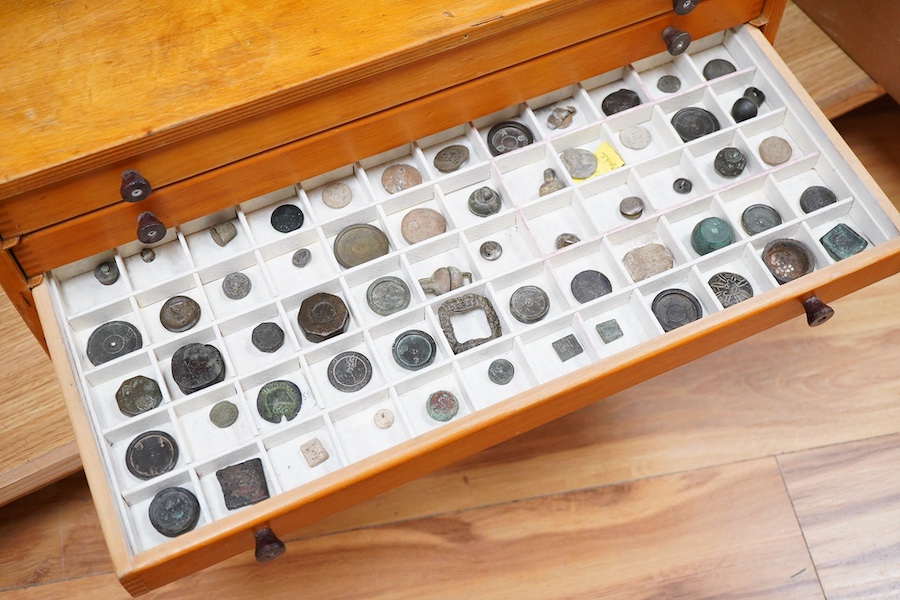 A collection of mainly Medieval to 19th century bronze and lead imperial circular trade weights, with a few Roman and later examples, stamped with Royal Cyphers, weights, the dagger assay mark for London, other proof mar